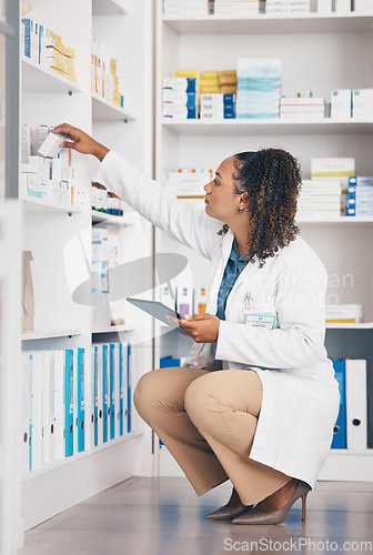 Image of Pharmacy, product and pharmacist woman on tablet for medicine management, stock research or inventory. Digital, logistics and retail or medical doctor, reading box or pharmaceutical quality assurance