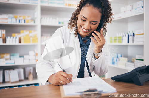 Image of Phone call, counter and pharmacy woman for medicine, customer service or virtual healthcare support. Happy doctor, medical person or pharmacist for checklist, writing notes and telephone at help desk