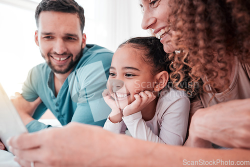 Image of Happy family on bed with tablet, kid and movies, streaming service for child development and educational video. Mom, dad and girl bonding in bedroom, happiness and smile with digital entertainment.