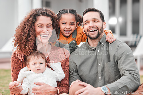 Image of New home, real estate and portrait of a happy family bonding outside a house feeling excited and happiness. Smile, love and mother relax with children, kids and father with care together