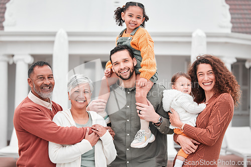 Image of Portrait, big family with smile and piggy back at new home, grandparents and parents with kids in happiness and security. Happy men, women and children in backyard together with love outside house.