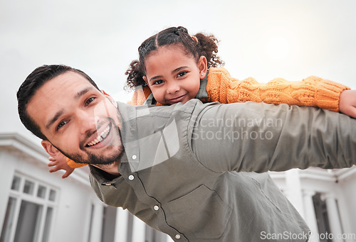 Image of Portrait, piggy back and happy man with child in yard of new house, happiness and security at family home. Homeowner, father and girl bonding in backyard together with love and outdoor fun on weekend