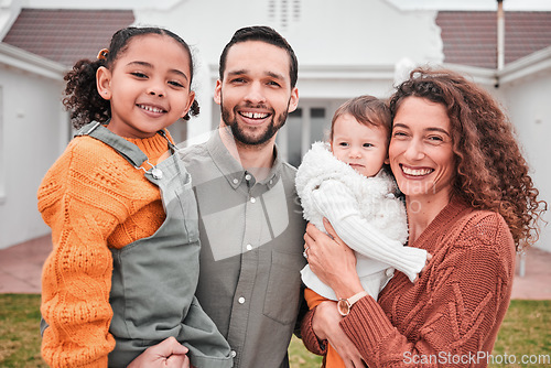 Image of New home, family and portrait couple with children bonding outside a house feeling excited and happiness. Smile, interracial and mother relax with children, kids and father together on vacation