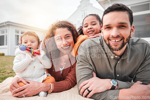 Image of Relax, picnic and portrait of a happy family bonding outside a house feeling excited and happiness. Smile, interracial and mother with children, kids and father with care together on vacation