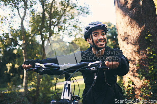 Image of Fitness, bike and Asian man outdoor, exercise and training with workout, practice and wellness. Male biker, person and guy in nature, outside and cycling for workout, sports and motivation for energy