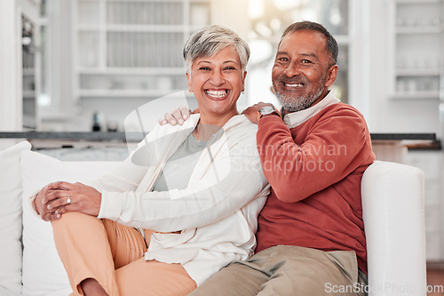 Image of Couple, senior portrait and smile in home living room, bonding and having fun in retirement together on sofa. Love, happiness and elderly man and woman relax on couch, care and enjoying quality time.