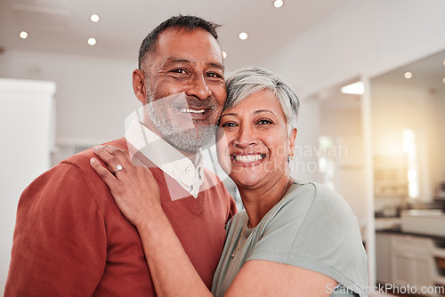 Image of Portrait, smile and senior couple in home, bonding and embrace together. Love, retirement and face of elderly man and woman with happiness, commitment or hugging while enjoying romantic time in house