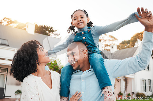 Image of Happy, parents and carrying girl on shoulder relax in garden for bonding, quality time and playing outdoors. Love, family and dad with mom, child and kid smile on summer vacation, weekend and freedom