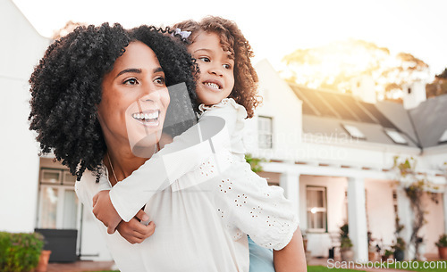 Image of Family, happy and mother with girl on back relax in home garden for bonding, quality time and playing outdoors. Love, backyard and mom carry child with smile on summer vacation, weekend and holiday