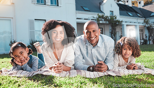 Image of Family, children and portrait outdoor with parents on lawn in backyard for love and care. Happy kids, man and woman together for support, peace or quality time with a smile for security on blanket