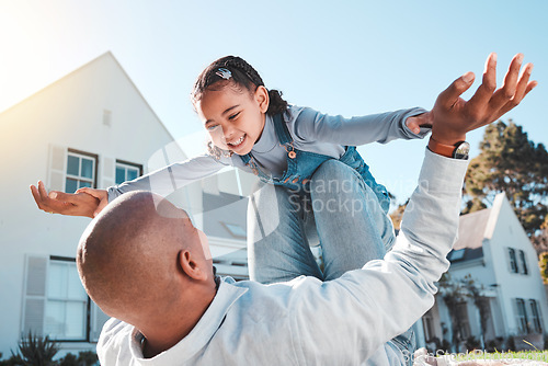 Image of Family, happy or father lift girl in home garden for bonding, quality time or playing outdoors. Love, new house and dad with child flying in air and smile on summer vacation, weekend and holiday game