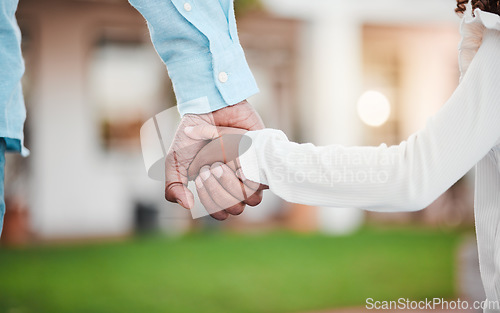 Image of Holding hands closeup, parent and kid together in garden with dad love, care or support. Papa, family and child hand in outdoor solidarity, nature and trust with father and young person in affection