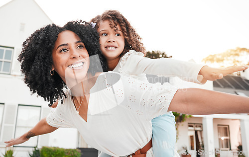 Image of Play, flying or mother with girl on back in home garden bonding, quality time and playing outdoors. Love, airplane and happy mom piggyback with child on summer vacation, weekend or backyard holiday