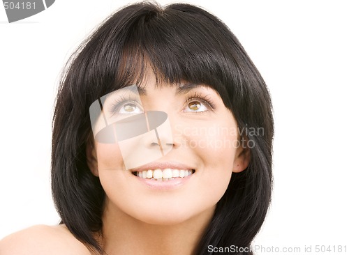Image of happy woman looking up
