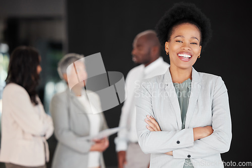 Image of Black woman, portrait smile and business leadership for meeting, planning or teamwork collaboration at the office. Happy and confident African American female smiling with arms crossed for management