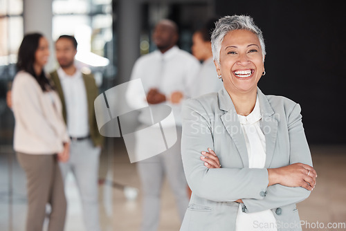 Image of Business woman, portrait smile and leadership for corporate management or meeting at the office. Happy and confident senior female CEO smiling in teamwork, success or career ambition at the workplace