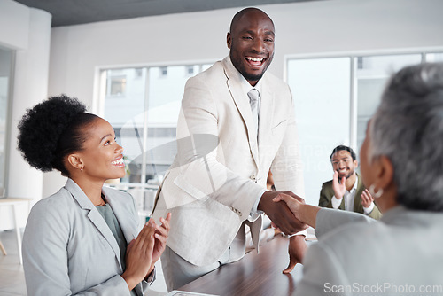 Image of Happy business people, handshake and success in meeting for support and applause, hiring or team onboarding. Collaboration, shaking hands and congratulations, promotion and achievement with diversity