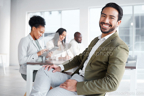 Image of Portrait, boardroom and a business man in the office with a positive mindset for planning or strategy. Corporate, professional and vision with a happy young male employee sitting in a work meeting