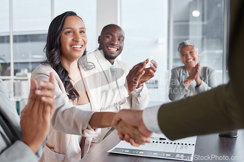 Image of Business people, shaking hands and success meeting with support and applause, hiring or onboarding for team. Collaboration, handshake and congratulations, promotion and achievement in happy diversity