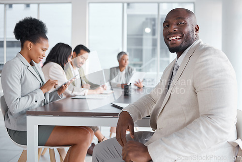 Image of Businessman, portrait smile and leadership in meeting, planning or teamwork collaboration at the office. Happy black man leader or manager smiling in team management or idea strategy in the boardroom