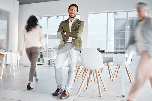 Image of Busy office, portrait and proud man with business leadership, employee management and workspace confidence. Happy professional worker, manager or asian person arms crossed in startup job or career