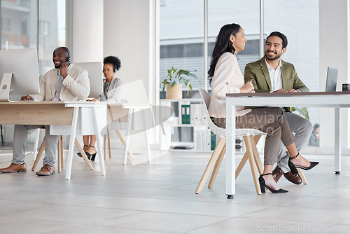 Image of Call center, office and business people talking, speaking or communication in workplace. Telemarketing, happiness and group, man and woman or consultants in discussion for customer support in company