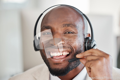 Image of Callcenter consultant, black man and CRM, face and happiness, phone call and contact us. Portrait, telecom and male with smile, customer support or telemarketing with agent and help desk employee