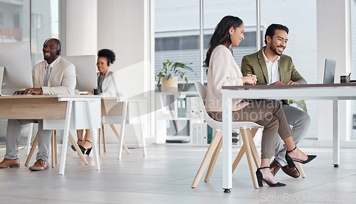 Image of Call center, laptop and business people in office, teamwork or talking in workplace. Telemarketing, computer and happiness of group, man and woman or sales agents for customer support in company.