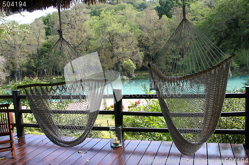 Image of Terrace of luxury jungle resort by river