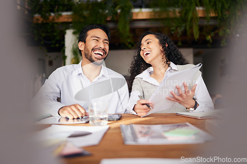 Image of Collaboration, documents and laughing with a business team in the office and working together on a report. Teamwork, funny or strategy with man and happy woman colleagues or employees with paperwork