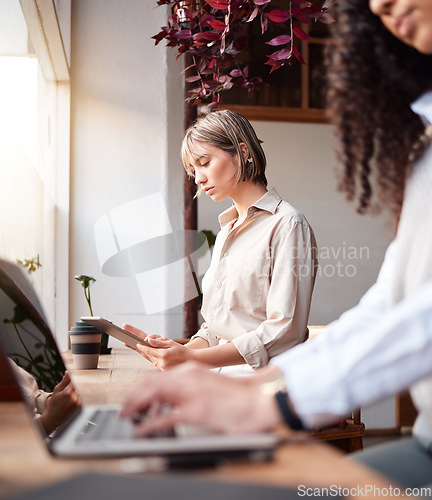 Image of Coffee shop, remote work and people on computer, tablet and internet for online business, project planning and typing. Diversity customer or women coworking in cafe or cafeteria on laptop technology