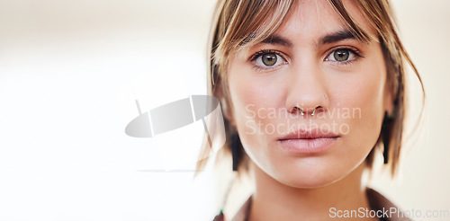 Image of Beauty, serious and portrait of a woman in a studio with a positive and confidence mindset. Beautiful, young and headshot of female model from Mexico standing by a blurry background with mockup space