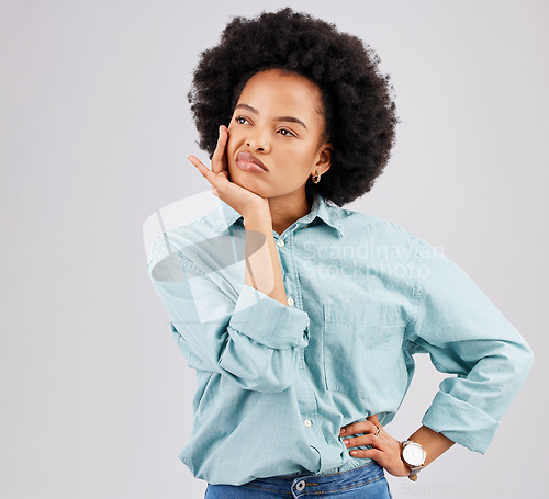 Image of Bored, confused and a thinking black woman with a decision isolated on a white background in a studio. Idea, boredom and an African girl with doubt about a plan, solution or ideas on a backdrop