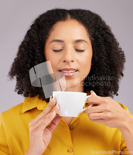 Image of Relax, enjoying aroma and a woman drinking coffee isolated on a white background in studio. Calm, content and a girl with a warm beverage or cup of tea for relaxation, peace or a break on a backdrop