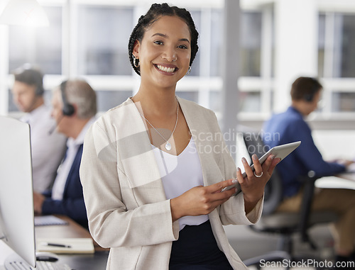 Image of Happy, confidence and portrait of a businesswoman in the office with digital tablet for research. Happiness, smile and professional female employee working on project with mobile device in workplace.