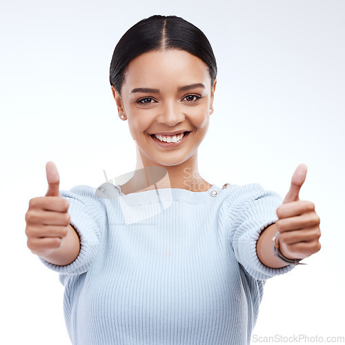 Image of Woman, thumbs up and portrait isolated on a white background success, thank you and support, like or vote. Winner business person with yes, ok and agreement hands sign or emoji for winning in studio