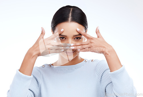 Image of Frame eyes, hands or portrait of woman on white background for beauty, cosmetics or natural makeup. Fashion mockup, hiding or face of isolated girl in perspective, confident or vision emoji in studio