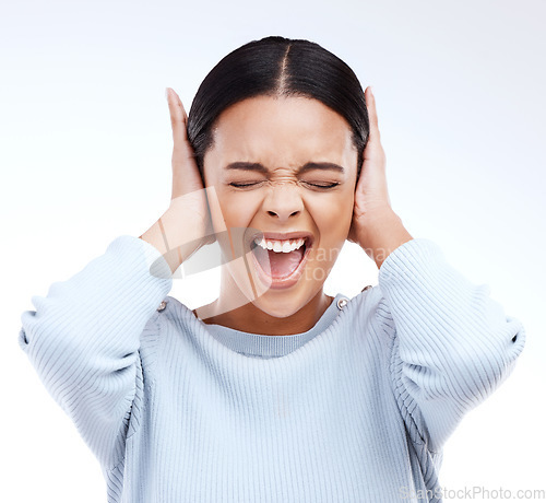 Image of Shouting, woman and hands on ears for noise, silence or denial gesture on studio white background. Anxiety, face and annoyed girl in stress, ignoring and deaf or wtf, emoji and frustrated expression