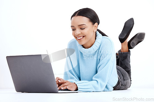 Image of Studio, laptop or floor woman typing internet, web or website search for student research, digital study or project. Knowledge education, online report or learning female isolated on white background