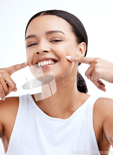 Image of Happy, beautiful and portrait of a woman for beauty isolated on a white background in a studio. Smile, skincare and face of a young model looking confident about clear complexion and smooth skin