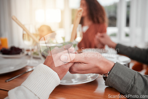 Image of Family, dinner and party, hands together to pray, gratitude for food and love, celebration and holiday. Worship, thank God and relationship, hungry people with meal and social event or gathering