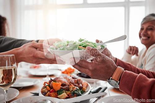 Image of Food, salad and hands with dinner and party, social gathering or event with family or friends and celebration. Holiday, fun and feast with love, meal and nutrition, people have meal together