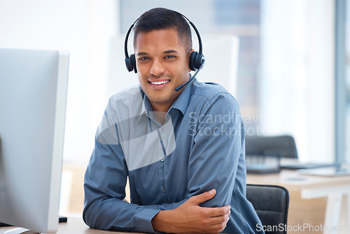 Image of Call center portrait, smile or happy man in communication for telecom customer services in crm office job. Contact us or friendly sales agent consulting on microphone in technical support help desk