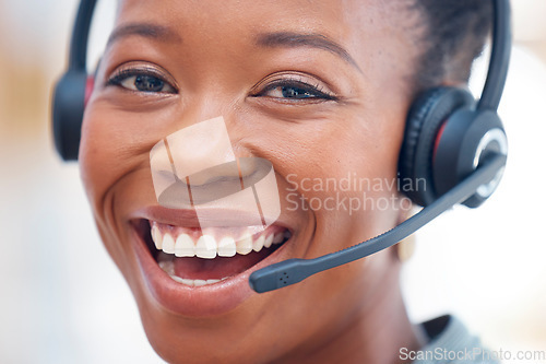 Image of Portrait, call center and customer service with a consultant black woman closeup in her office for support. Face, happy and smile with a female consulting using a headset for telemarketing or sales