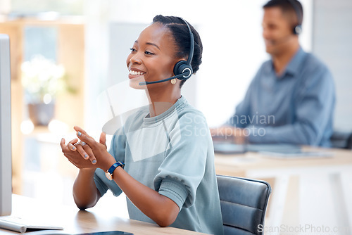 Image of Call center, smile or friendly black woman in communication at telecom customer services office. Microphone, crm or happy African sales agent consulting, speaking or talking in tech support help desk