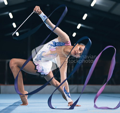 Image of Portrait of flexible woman, ribbon gymnastics and dance for performance, sports competition and action show. Female, rhythmic movement and dancing athlete with creative talent, balance and agility