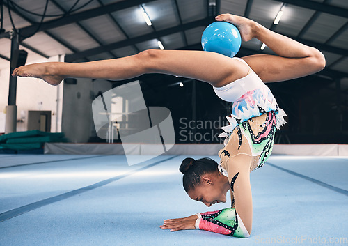 Image of Woman, gymnastics and ball for flexible performance, body balance and dancer in sports arena. Female, rhythmic movement and dancing upside down for creative talent, solo concert and agility challenge