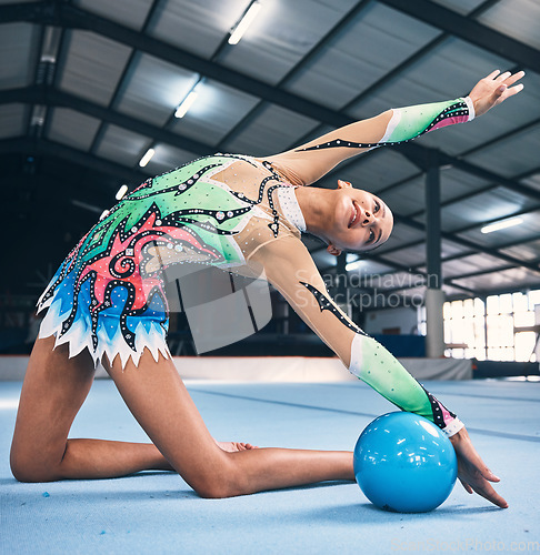 Image of Flexible woman, gymnastics and ball for performance, competition training and dancing in sports arena. Female, rhythmic movement and dancer in creative talent, solo concert and stretching for agility