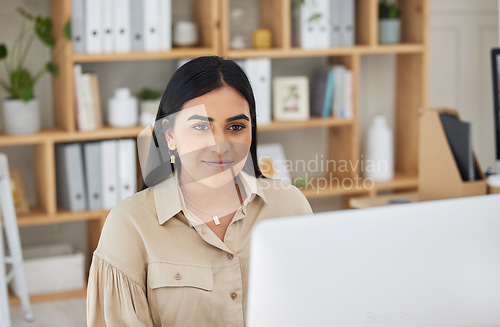 Image of Business, digital or Indian woman typing on computer working on email or online project research. Technology, office feedback or girl journalist writing blog reports or internet articles with focus