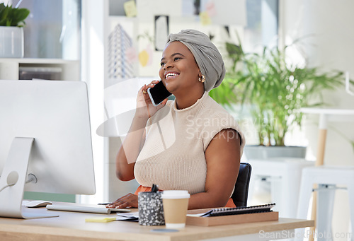 Image of Startup, business or happy black woman on a phone call talking, communication or speaking of ideas in office. Smile, laughing or funny mature African employee networking for a deal or negotiation